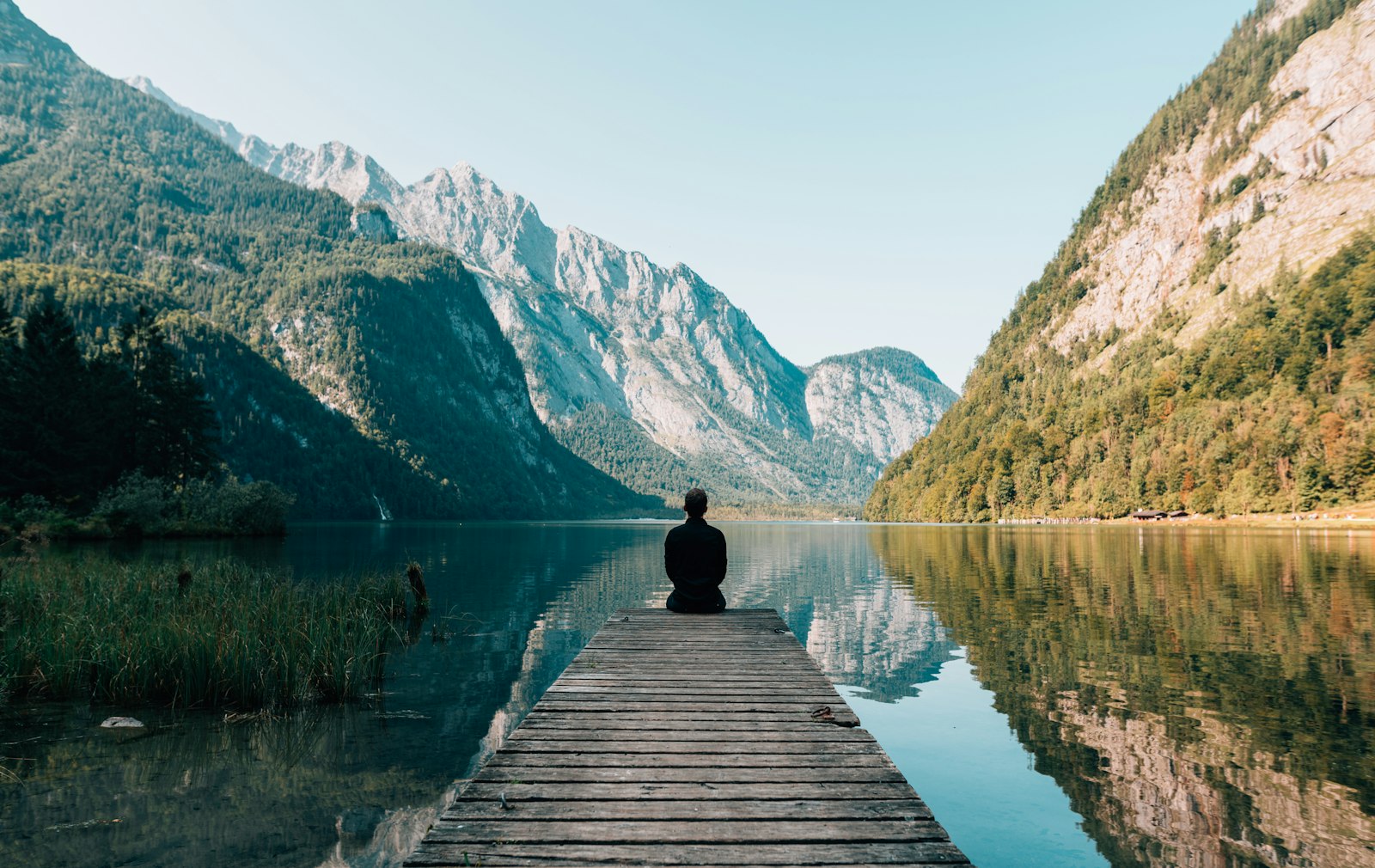 Meditator by a still lake — kundalini awakening