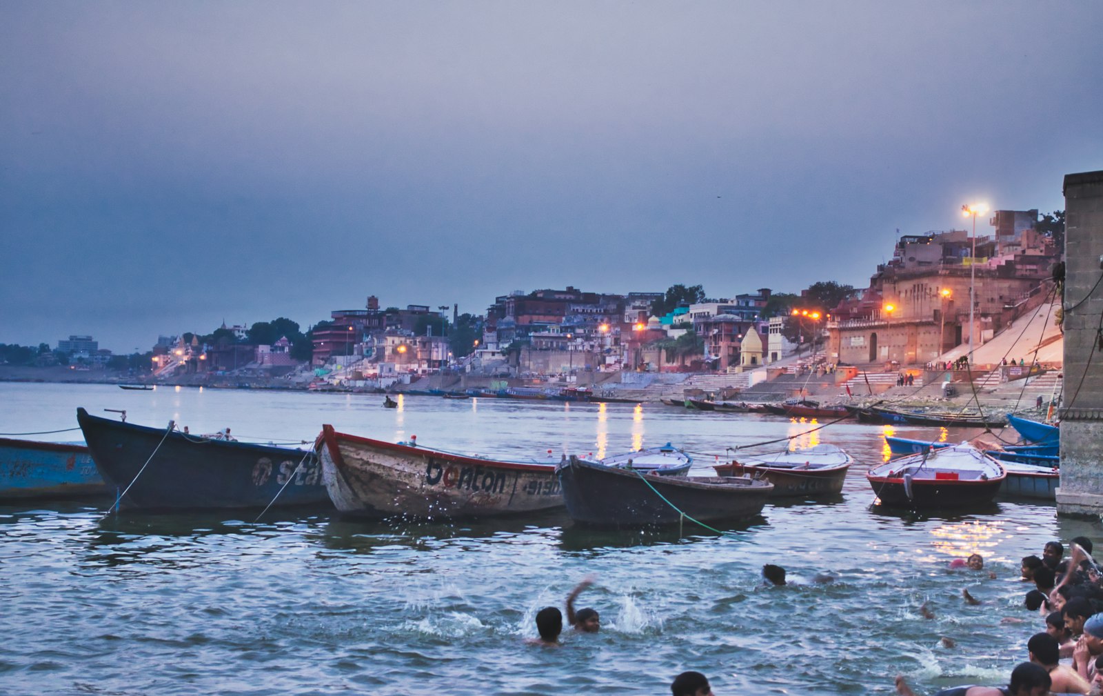 Boats on the Ganges at dawn during a spiritual retreat in India