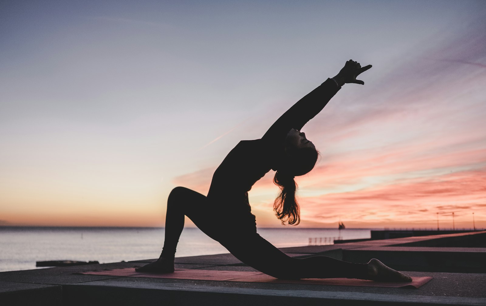 Yoga asana practice at sunrise for chakra balance